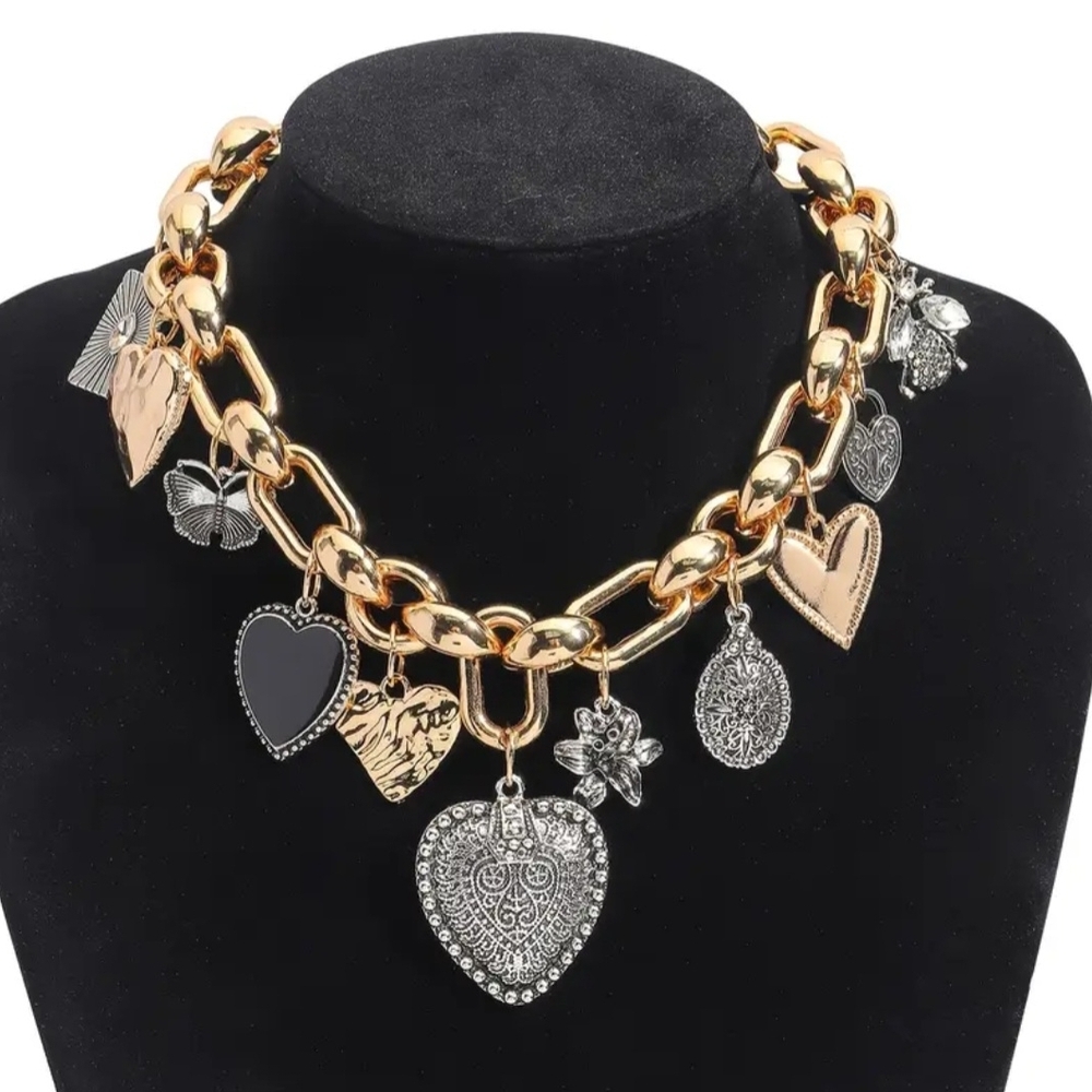 Gold Tone Heart Charm Statement Necklace with Mixed Metal Accents